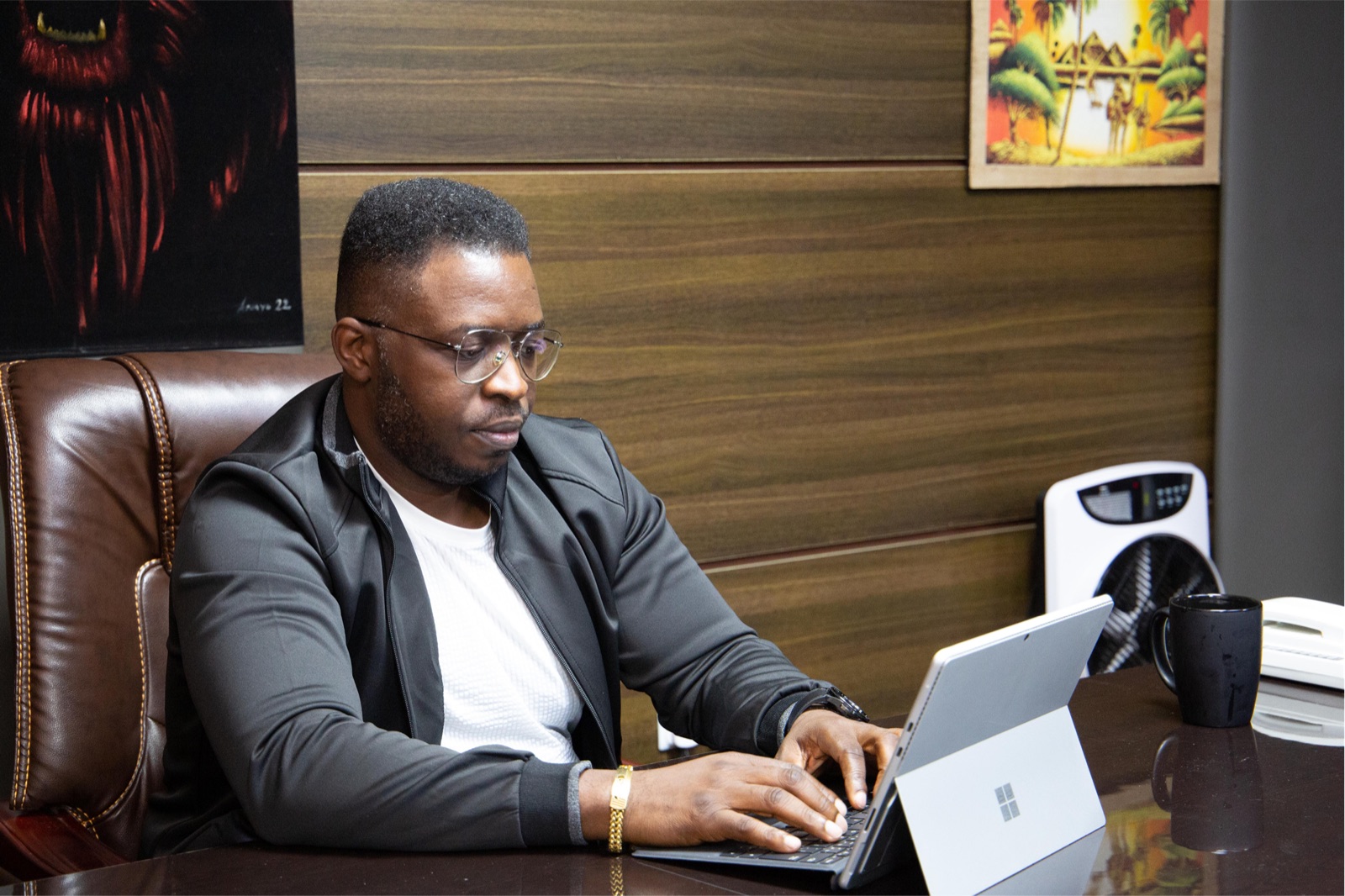 Ifeanyi Aneke at his desk